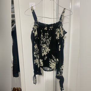 Selling a black blouse with badge color